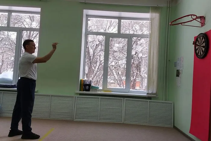 Игра в дартс