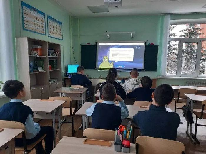 Ученики на уроке цифры